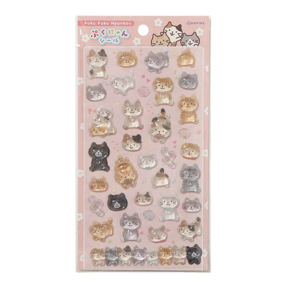 ふくふくにゃんこ ぷくにゃんシール ピンクの商品画像。ピンクの台紙に、ふくふくにゃんこたちのぷっくりしたシールが多数並んでいる。