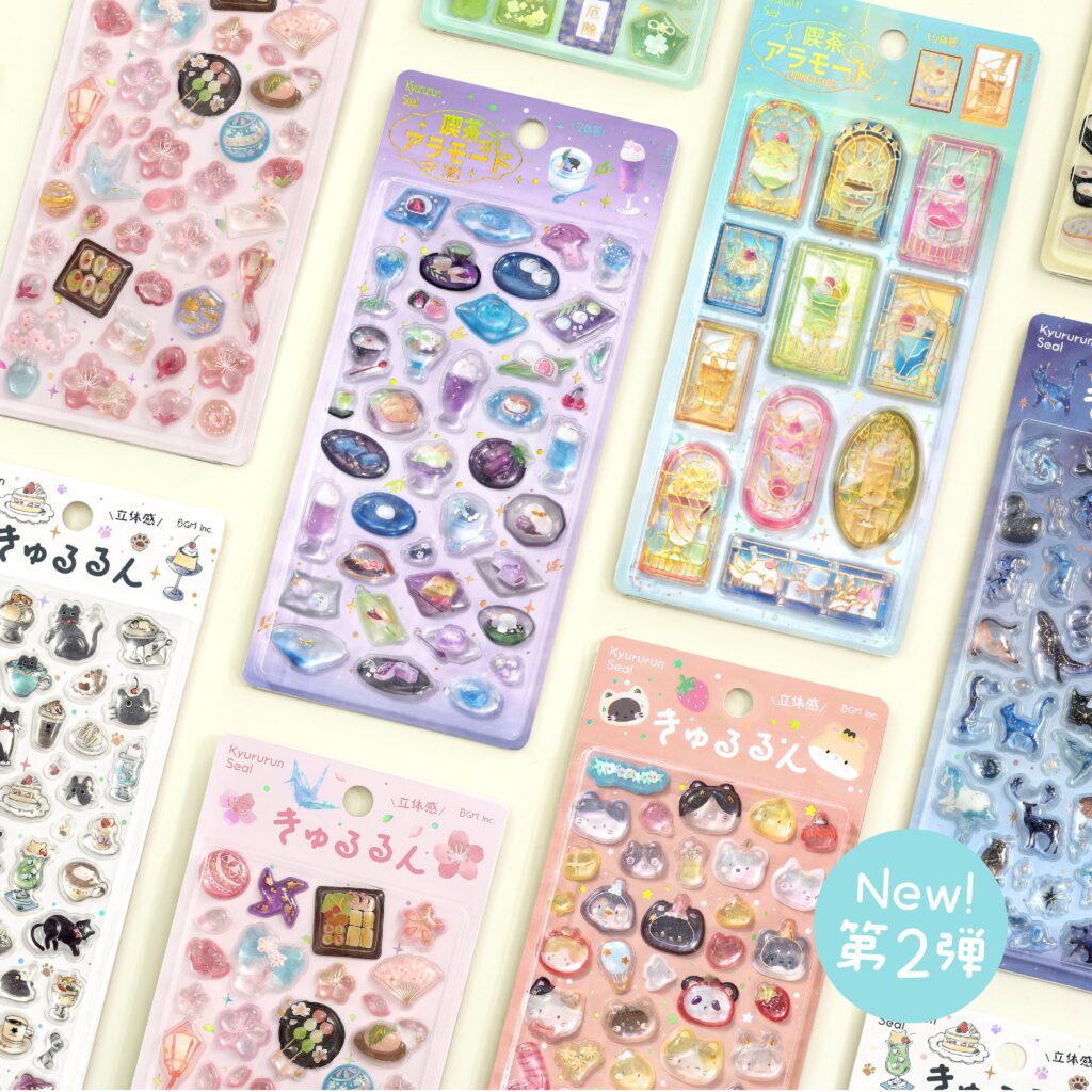 宝石や鉱石、ステンドグラス風デザイン、動物モチーフなどが並んだ立体感のあるカラフルなデコレーションシールセット